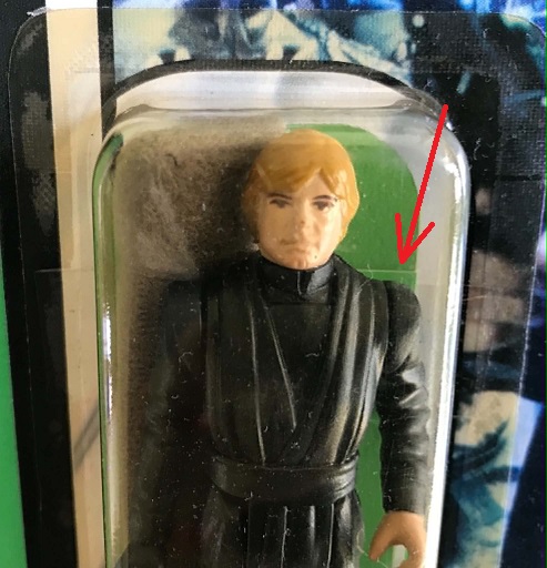 earlier Taiwan 65-A MOC green slip behind figure.jpg